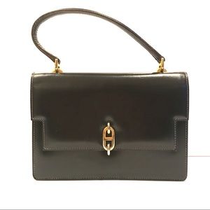 Stunning Morabito Vintage smooth brown leather handbag with gold metal details.